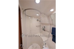 Bathroom interior of 2005 Tiara Yachts 3900 Convertible, featuring shower and modern fixtures.