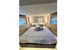 Luxurious bedroom interior of 2022 Azimut AZIMUT 68 FLY yacht with modern design.