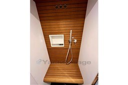 Luxurious wooden shower interior on 2022 Azimut AZIMUT 68 FLY yacht.