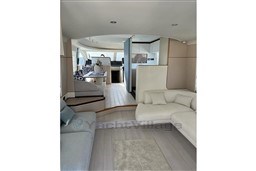 Luxurious interior of 2022 Azimut AZIMUT 68 FLY yacht with modern furnishings.