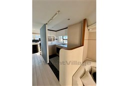 Interior of 2022 Azimut AZIMUT 68 FLY yacht, featuring modern kitchen and sleek design.