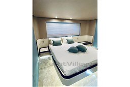 Luxurious bedroom interior of 2022 Azimut AZIMUT 68 FLY yacht with modern design.