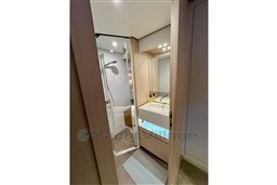 Luxurious bathroom interior of 2022 Azimut AZIMUT 68 FLY yacht, featuring modern fixtures.