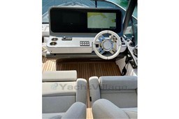 Cockpit of 2022 Azimut AZIMUT 68 FLY yacht with modern steering and navigation display.