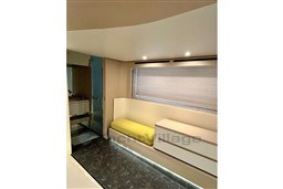 Interior of 2022 Azimut AZIMUT 68 FLY yacht with modern seating and sleek design.