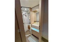 Luxurious bathroom in 2022 Azimut AZIMUT 68 FLY yacht with modern fixtures and lighting.