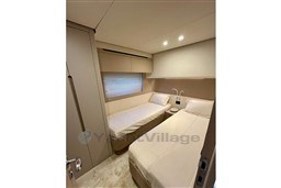 Interior cabin of 2022 Azimut AZIMUT 68 FLY yacht with twin beds.