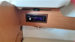 Interior of 2008 Jeanneau Cap Camarat 755 WA with Kenwood stereo system.