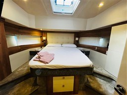 Luxurious bedroom interior of 2019 Cranchi ECO Trawler 43 Long Distance yacht.
