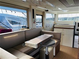 2019 Cranchi ECO Trawler 43 Long Distance interior with modern seating and large windows.