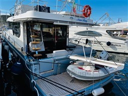2019 Cranchi ECO Trawler 43 Long Distance docked, featuring a spacious deck and modern design.