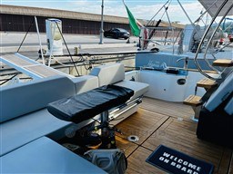 2019 Cranchi ECO Trawler 43 Long Distance yacht with wooden deck and "Welcome On Board" mat.