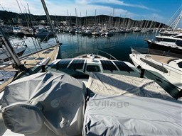 2019 Cranchi ECO Trawler 43 Long Distance docked in a marina with sailboats.