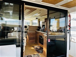Interior view of 2019 Cranchi ECO Trawler 43 Long Distance yacht, featuring modern kitchen and seating.