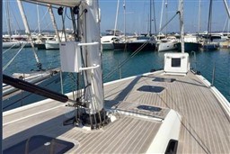 2024 Solaris 50 yacht deck with marina view, showcasing sleek design and modern features.