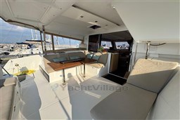 2024 Fountaine Pajot Isla 40 yacht interior with spacious seating and dining area.