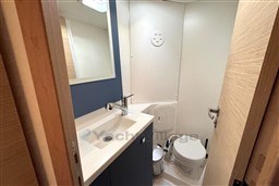 2024 Fountaine Pajot Isla 40 yacht bathroom with modern sink and toilet.