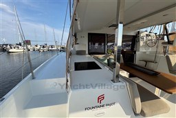 2024 Fountaine Pajot Isla 40 catamaran interior with marina view.