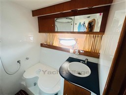 Bathroom interior of 2005 Innovazione e Progetti Mira 43 yacht, featuring sink and shower.