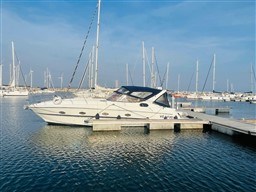 2005 Innovazione e Progetti Mira 43 yacht docked in a marina.