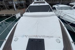 2020 Azimut S6 yacht docked, covered deck, sleek design, luxury vessel.