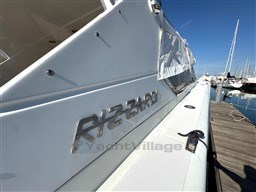 2000 Rizzardi CR 53 Top Line yacht docked at marina, side view.