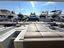 Rizzardi CR 53 Top Line 2000 yacht docked among other luxury boats in a marina.