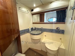 Bathroom interior of 2000 Rizzardi CR 53 Top Line yacht, featuring sink and toilet.