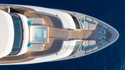 Aerial view of 2022 Sanlorenzo SD96 yacht with jacuzzi and seating area.