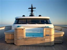 Sanlorenzo SD96 yacht 2022, featuring a luxurious deck with a jacuzzi at sunset.