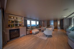 Luxurious interior of 2022 Sanlorenzo SD96 yacht with modern furnishings and ocean view.