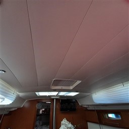 Interior view of 2008 Beneteau Oceanis 43 sailboat cabin ceiling and windows.