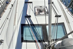 Deck view of a 2008 Beneteau Oceanis 43 sailboat with rigging and hatches.