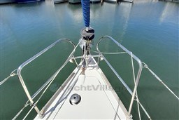 Bow of 2008 Beneteau Oceanis 43 sailboat in marina.