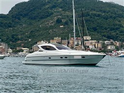 2004 Primatist G 50 Speedster yacht on scenic coastal waters.
