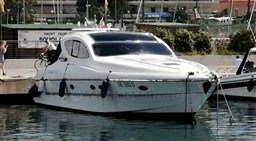 2004 Primatist G 50 Speedster yacht docked at a marina.
