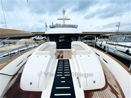 Azimut Magellano 50 yacht, 2011 model, docked with spacious deck and sleek design.