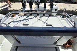 2022 Beneteau Antares 8 Fishing boat deck with rod holders and storage.