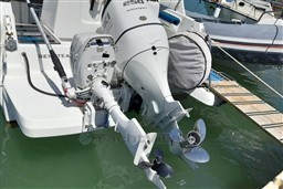 Outboard motor of 2022 Beneteau Antares 8 Fishing boat docked at marina.