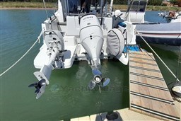 Beneteau Antares 8 Fishing 2022 boat with outboard motor docked at marina.