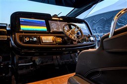 Manufacturer Provided Image: 2025 SACS Rebel 55 OB cockpit with advanced navigation displays and steering wheel.