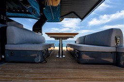 Manufacturer Provided Image: Luxury seating area on 2025 SACS Rebel 55 OB yacht with ocean view.