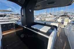 2023 Invictus TT 420 yacht interior with sleek design at marina.