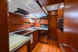 Luxurious wooden kitchen interior on 1978 Stain 70 Gulet yacht.