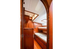 Interior of 1978 Stain 70 Gulet with wooden bunk beds and elegant design.