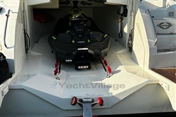 2006 Sunseeker Portofino 53 yacht with a jet ski in the garage.