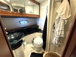 Luxurious bathroom in 2006 Sunseeker Portofino 53 yacht with modern fixtures and elegant design.