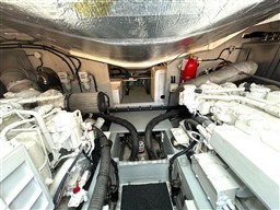Engine room of a 2006 Sunseeker Portofino 53 yacht, showcasing mechanical components.