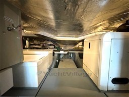 Engine room of a 2006 Sunseeker Portofino 53 yacht, showcasing mechanical components.