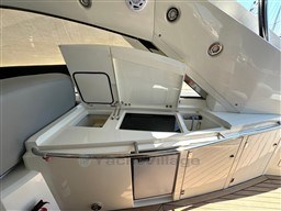 2006 Sunseeker Portofino 53 yacht interior with open kitchenette and sleek design.